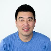 Middle aged Asian man with short black hair