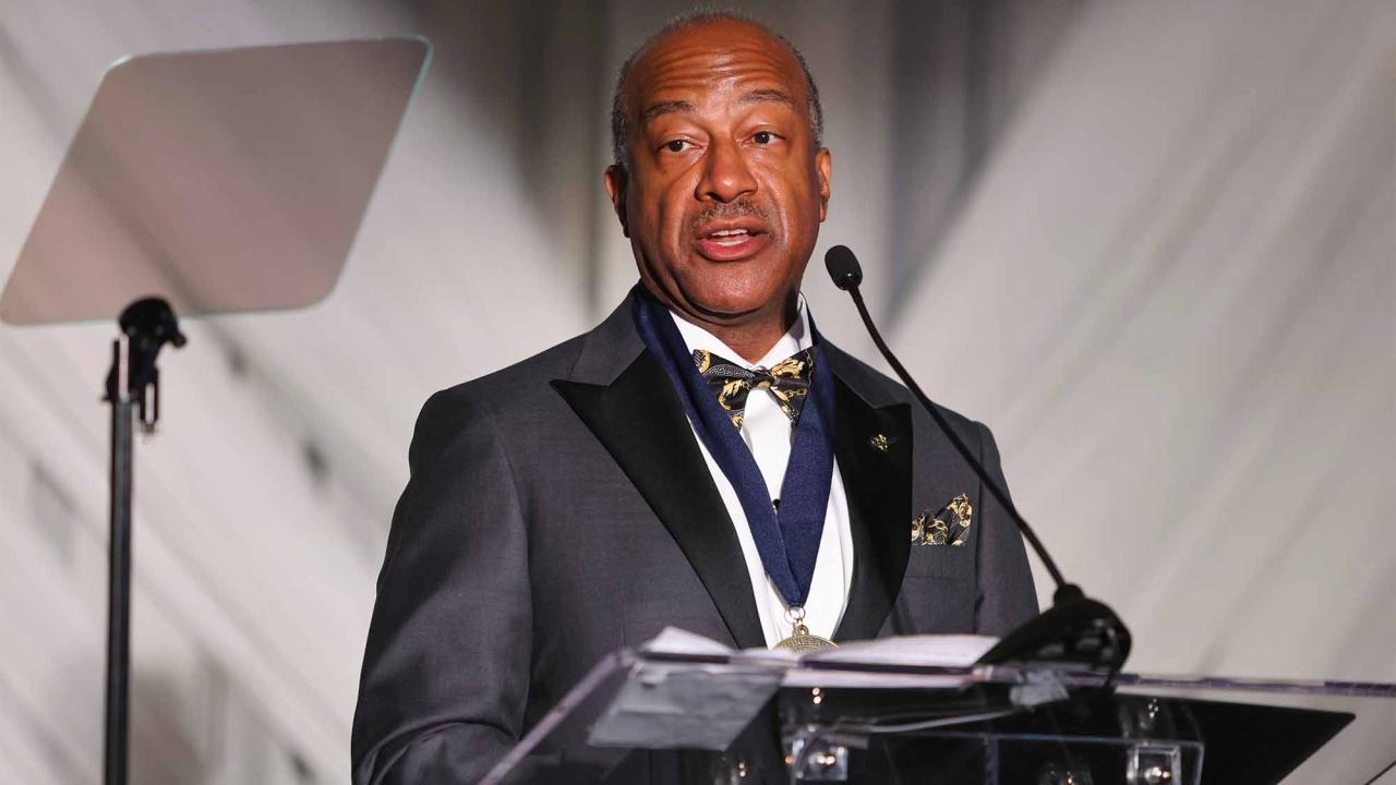 Gary May at podium