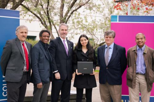 Sabrina Yarzada, College of Engineering faculty and CEO of USRA stand for a group photo