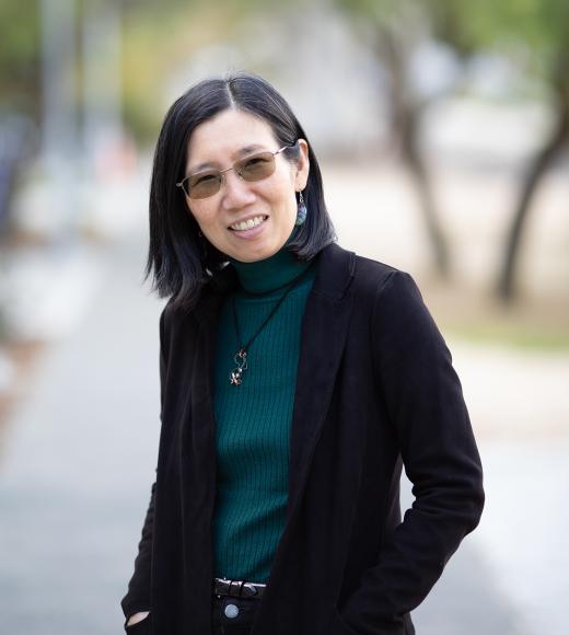 A woman poses for a photo