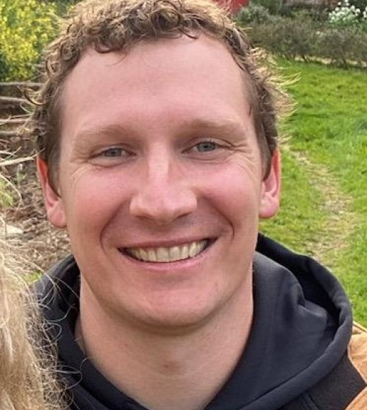 headshot of Logan Himes smiling