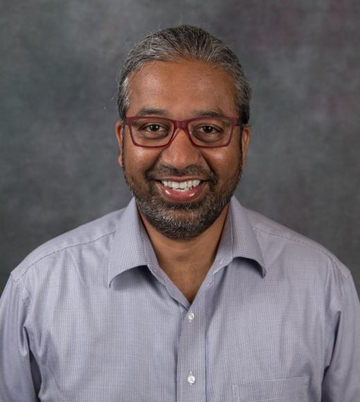 image of man in glasses and shirt