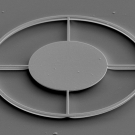A recessed shape that resembles a car wheel