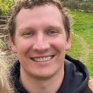 headshot of Logan Himes smiling