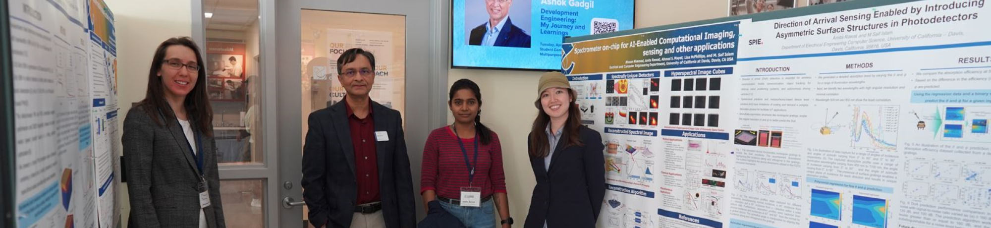 Prof. Saif Islam posing in Kemper Hall Lobby with ECE Graduate Students during the poster session for ECExpo 2024